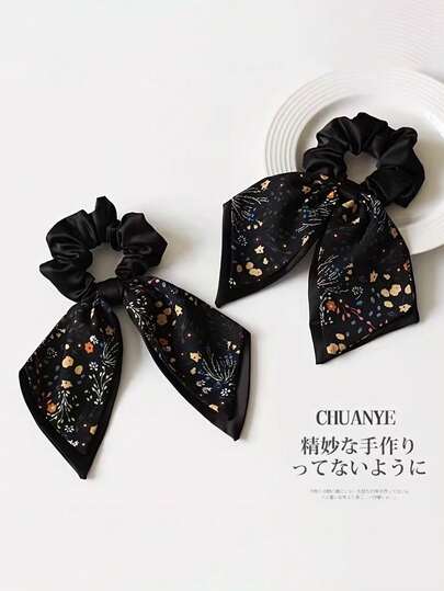 新款高端发圈，蝴蝶结和花朵设计，采用耐用且富有弹性的橡胶材质制成，适合各种发型