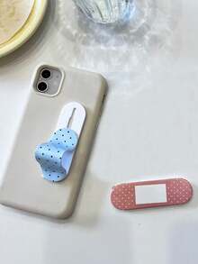 1 片创意原创创可贴和 1 个带图案的手机推拉支架，可背贴式安装，放置在桌面上作为懒人支架。 - 彩色 - 查看 3