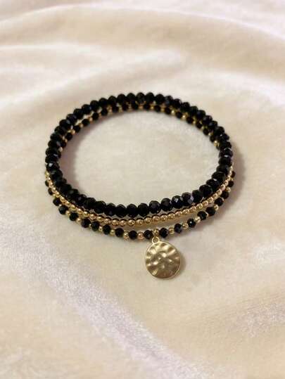 Set de pulseras elásticas minimalistas de cristal negro de múltiples hilos