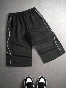 Quần short nam màu đen dài đến khuỷu tay (7/10) với dây rút ở eo và sọc trắng tương phản, kiểu dáng thường ngày và thời trang. - màu đen - Xem 5