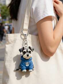 这款2D立体可爱雪纳瑞犬吊坠，身穿蓝色卫衣，采用趣味十足的2D立体亚克力小狗设计。这款萌宠狗狗钥匙扣适合装饰手提包、钱包，是一款多功能钥匙扣和钥匙圈装饰品，可用于汽车钥匙、手机钥匙、背包、钱包等，是宠物爱好者的时尚配饰，也是母亲节和开学季的理想之选。 - 彩色 - 查看 6