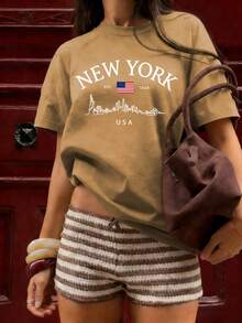 女士夏季新款休闲标语印花宽松圆领短袖T恤，时尚日常度假穿搭，适合日常及节假日穿着。女士T恤上衣。 - 棕色 - 查看 1