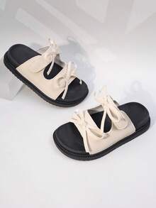 1 đôi dép xăng đan đế bằng thoải mái, màu trơn tối giản dành cho bé gái, có nơ trang trí, thích hợp cho mùa hè đi biển. - Màu be - Xem 6