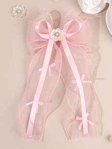 1个粉色薄纱蝴蝶结发夹，透明欧根纱材质，饰有缎带和人造珍珠雏菊，精致发饰，适合春季、婚礼和特殊场合。 - 彩色 - 查看 9