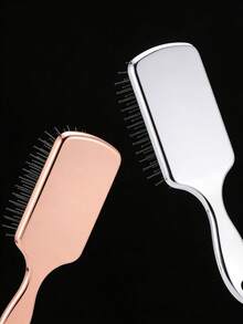 1 chiếc lược đệm khí màu vàng hồng, lược tạo kiểu tóc bồng bềnh, mượt mà, uốn xoăn, lược massage chống tĩnh điện dùng được cả khi khô và ướt trong gia đình. - Lược đệm khí - Xem 3