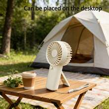 迷你手持风扇，使用2节AAA电池供电（不含电池），配有挂绳。适合户外、旅行和露营——随时随地保持凉爽，也是绝佳的派对礼物。风扇的续航时间取决于电池容量。 - 顏色 - 查看 15