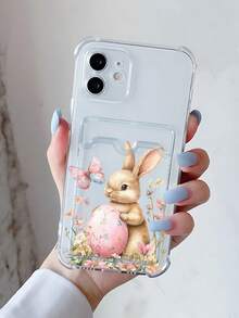 Funda Kawaii con conejo abrazando huevo de Pascua rosa, mariposa flotante y flores silvestres en estilo acuarela, Tierno, Adorable, Estético, Perfecta para Chicas que aman los diseños primaverales, dulces y llenos de encanto natural, Funda transparente con tarjetero compatible con Apple iPhone17 Pro Max, 17 Pro, 17 Air, 16 Pro Max, 16 Pro, 16E, 17, 16, 15, 14, 13, 12, 11, Plus, Pro, Pro Max Cases, para Galaxy S25, S24, S23, S22, GalaxyA02S,A03,A04,A05,A06 4G,A12,A13,A15,A16,A21S,A24,A25,A32,A32,A34,A35,A54,A55, y para Moto:Edge 50 Fusion,E13,Edge 50 Pro,Edge 50,G04,G14,G54,G84, y para OPPO\Rendmi,Funda protectora transparente de TPU suave a prueba de golpes. ideal como regalo para mujeres y chicas. - transparente - Ver 1