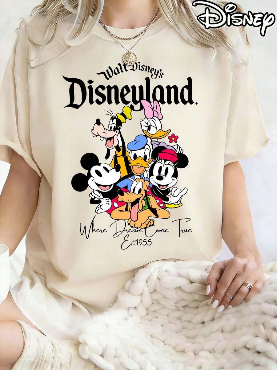 This Disney-Licensed Women's Summer Cotton T-Shirt Is A Disney 2026 Travel Souvenir. The Front Features Classic Disney Characters And Disneyland Logos, Perfect For Taking Photos At Disneyland, As A Travel Souvenir, For Everyday Casual Wear, Or For Matching Family Outfits. It Also Makes An Ideal Valentine's Day Gift For Friends And Family. Men's And Women's Clothing, New Spring Style, Comfortable And Skin-Friendly, Suitable For Outdoor Wear. - Apricot - View 1