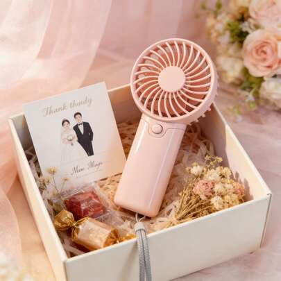 1个迷你手持风扇，带腕带，1档风速设置，需使用AAA电池（不包含在内）