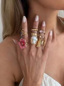 Set de 8 piezas de anillos apilables de metal con flores irregulares, incrustaciones de perlas falsas y diseño geométrico exagerado en estilo bohemio elegante. Joyería lujosa para bodas, fiestas, días festivos, uso casual diario, fotos callejeras, regalo unisex. - anillo - Ver 4