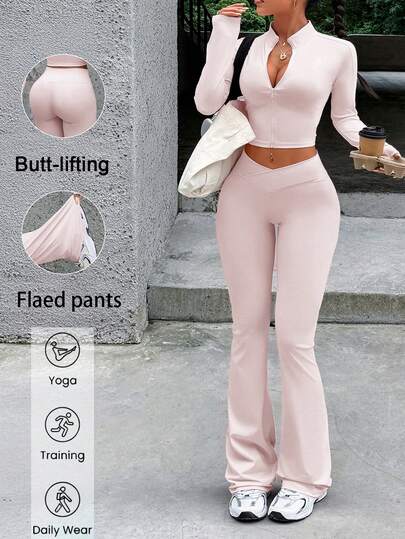بدلة رياضية للنساء من قطعتين، لفصلي الربيع والصيف، بلون أحادي، بتصميم نحيف مع أكمام وسحاب علوي وبنطال خصر عالي للأرداف، مناسبة للجيم والرياضة واللياقة البدنية والجري والبيلاتس واليوغا