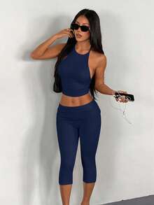 Bộ đồ nữ AITYI Studio, kiểu dáng thoải mái, màu trơn, dây mảnh, buộc sau lưng, hở lưng, thời trang gợi cảm, ôm sát, phong cách Y2K, đồ mặc nhà, đi biển, dự tiệc, nghỉ mát, thích hợp cho các dịp lễ, tốt nghiệp, lễ hội, lễ Phục sinh, lễ hội âm nhạc, mùa hè. Bộ gồm áo hai dây và quần lửng dệt kim. - Màu xanh hải quân - Xem 3