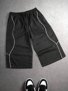 Quần short nam màu đen dài đến khuỷu tay (7/10) với dây rút ở eo và sọc trắng tương phản, kiểu dáng thường ngày và thời trang. - màu đen - Xem 4