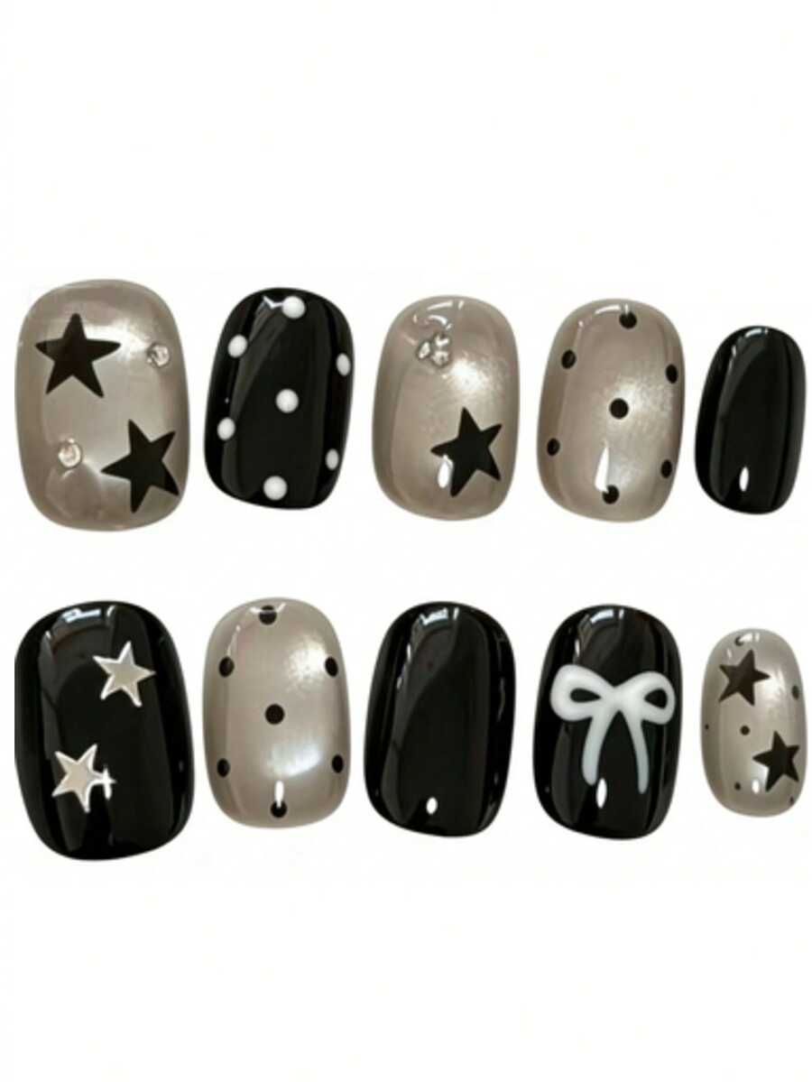 10pcs It's Named Star Bow Gold Black. This Manicure Features A Dynamic Mix Of Glossy Black And Shimmering Metallic Nude, Highlighted By Hand-Painted Star, Polka Dot, And White Bow Motifs. The Glossy Finish Amplifies The Rich, Metallic Sheen, Making It A Perfect Choice For Those Who Love Luxurious Yet Edgy Nail Art. - Black - View 1