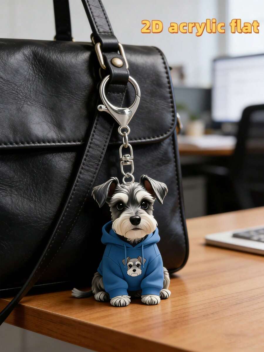这款2D立体可爱雪纳瑞犬吊坠，身穿蓝色卫衣，采用趣味十足的2D立体亚克力小狗设计。这款萌宠狗狗钥匙扣适合装饰手提包、钱包，是一款多功能钥匙扣和钥匙圈装饰品，可用于汽车钥匙、手机钥匙、背包、钱包等，是宠物爱好者的时尚配饰，也是母亲节和开学季的理想之选。