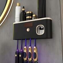 Giá đỡ bàn chải đánh răng thông minh 1 chiếc, giúp sắp xếp bàn chải đánh răng trong phòng tắm, tích hợp bộ phận phân phối kem đánh răng tự động. Thiết kế treo tường, 5 khe đựng, làm bằng nhựa, sử dụng pin lithium sạc qua cổng USB. - Nhiều màu - Xem 5