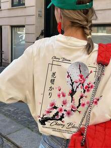 女士夏季圆领短袖T恤，樱花日式印花，宽松休闲百搭短袖上衣。适合办公室、外出、日常穿着、约会、派对、聚会、街头、嘉年华、音乐节、情人节、派对等场合。 - 杏色 - 查看 5