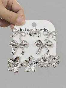 10件套全新简约高端UV镀层CCB树脂耳环套装，包含五瓣花、蝴蝶结和迷你心形几何耳环，是馈赠亲朋好友的优雅礼物。 - 銀色 - 查看 3