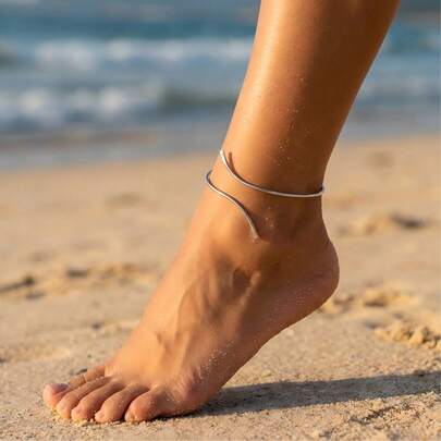 1 件铁艺弧线极简主义脚链，适合女士假日穿着