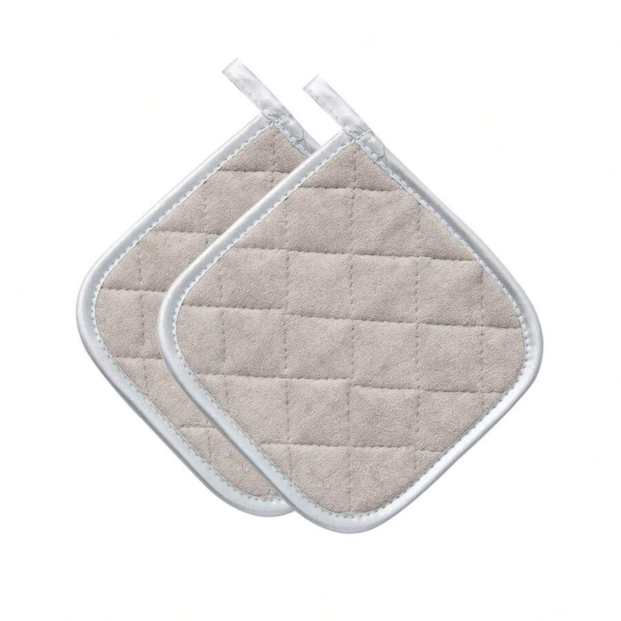 Miếng lót nồi, tấm lót cách nhiệt bằng cotton có thể giặt được, chịu nhiệt, dùng trong nấu nướng và làm bánh.