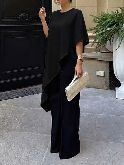 Áo kiểu dáng thanh lịch với vạt áo bất đối xứng, tay phồng, chất liệu satin, thích hợp cho tiệc tùng, hẹn hò, các dịp trang trọng, du lịch, màu đen.