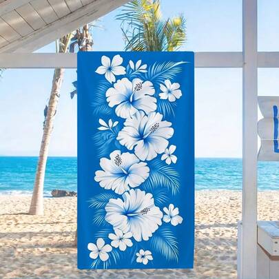 1条个性化印花速干沙滩巾，柔软舒适，男女皆宜，是海滩必备用品。