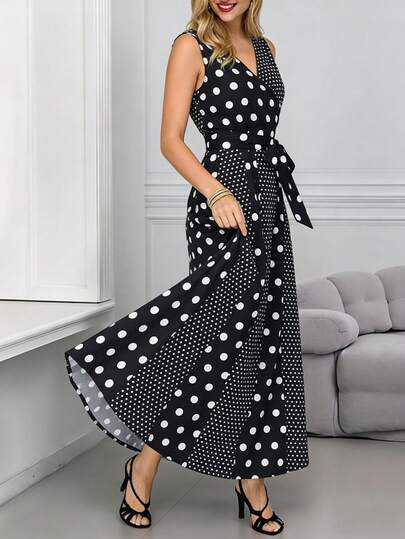 新款夏季V领无袖波点拼接系腰连衣裙，优雅长裙，适合通勤、度假、约会、派对等场合。
