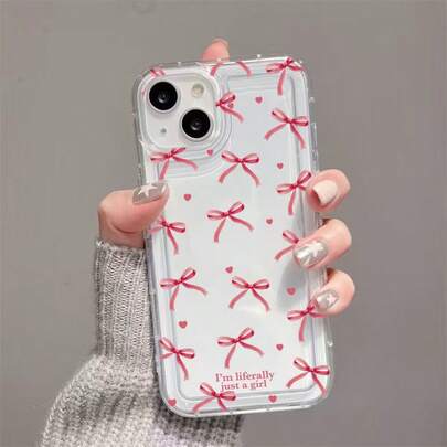 غطاء هاتف شفاف مطبوع بتصميم الفيونكة والقلب بطراز بسيط وأنيق متوافق مع هواتف آيفون 16/16 برو/16 بلس/16 إي/16 برو ماكس/15/15 برو/15 بلس/15 برو ماكس/14/14 برو/14 بلس/14 برو ماكس/13/13 برو/13 برو ماكس/13 ميني/12/12 ميني/12 برو/12 برو ماكس/11/11 برو/11 برو ماكس/X/XS/XR/XS ماكس/7G/7 بلس/8G/8 بلس