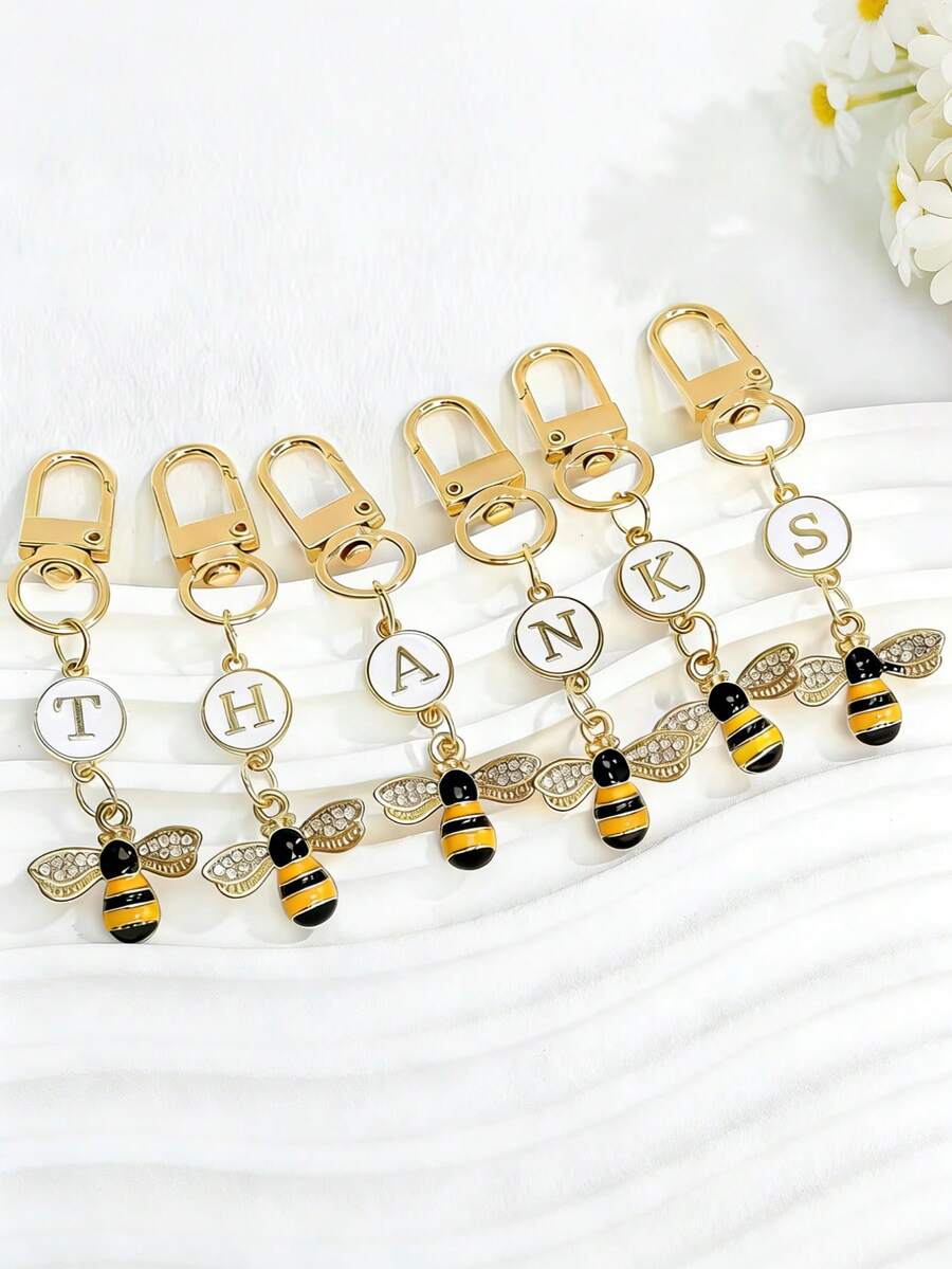 1 chiếc móc khóa hình con ong đính đá lấp lánh gồm 26 chữ cái từ A đến Z, mặt dây chuyền trang trí túi xách, quà tặng Lễ Tạ ơn và Ngày Nhà giáo. - Vàng - Xem 1
