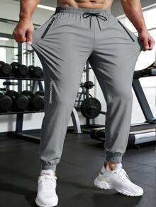 Men's Lightweight Sports Pants, Summer Fitness Training Running Casual Sweatpants With Drawstring Waist, Zipper Pockets, Ankle Cuffs - Grey - View 2