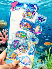 可爱的3D立体液体贴纸，海洋生物造型，摇一摇即可粘贴，适合用作游乐园奖品、学生礼物、装饰品。也是家居装饰、派对装饰、生日礼物、节日礼物的完美之选。时尚单品，奢华之选，适合缝纫和DIY。 - 彩色 - 查看 17
