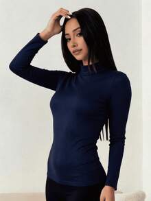 Playera Térmica de Manga Larga con Cuello alto  Corte entallado (slim fit) que se adapta perfectamente a la figura con total flexibilidad. - Azul Marino - Ver 1