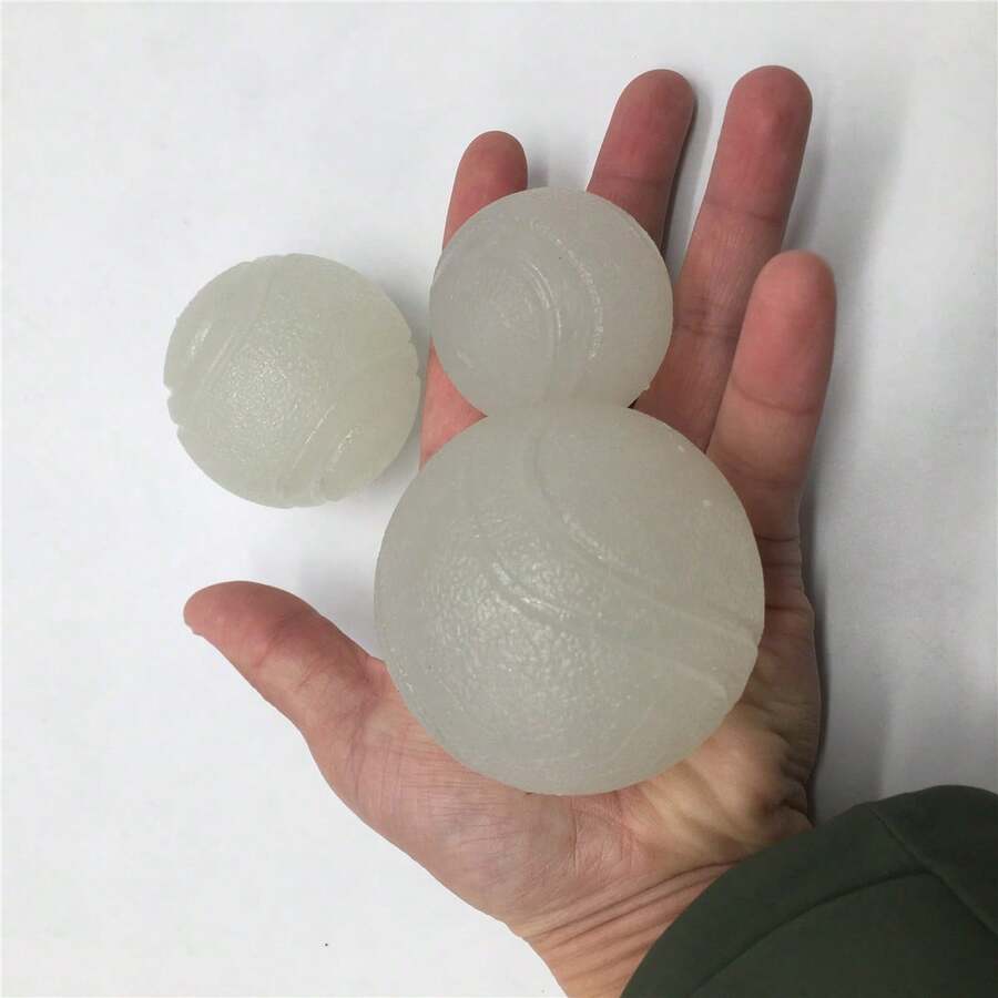 夜光橡胶狗狗心形球 - 耐用、耐啃咬玩具，适合所有犬种 - 互动玩耍，有益牙齿健康 条纹夜光球 - 白色 - 查看 1