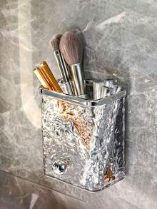 1个豪华壁挂式浴室收纳管，无需钻孔，可放置梳子、化妆刷、置物架，波浪形光泽表面，金属质感，梳妆台收纳架，浴室置物架，梳妆台，护肤品，化妆工具，收纳桶，钥匙，小物件悬挂式壁挂收纳管，安装简便，不损坏墙面，可拆卸设计，方便清洁，防潮防尘，浴室牙刷牙膏收纳架，优雅奢华的装饰收纳桶。 - 多色 - 查看 11