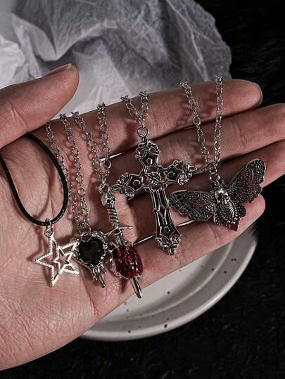 Set de 5 collares con diseños vintage góticos de cruz, corazón rojo, mariposa, espada, estrella y corazón derretido Y2K para mujeres y hombres