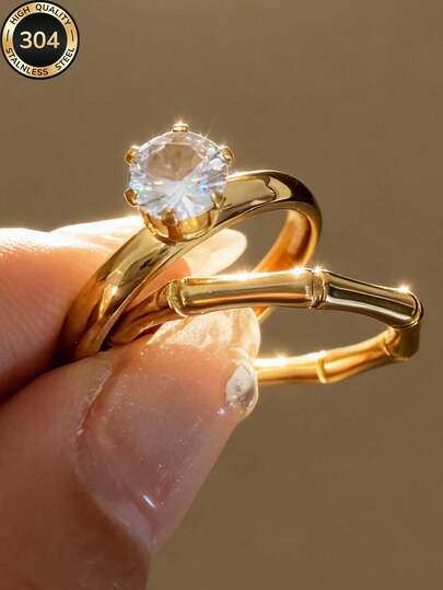 Anillo de acero inoxidable chapado en oro de 18K, diseño de nudo de bambú con solitario, accesorio de moda para mujer, adecuado para uso diario y vacaciones, también una opción de regalo ideal. Duradero, resistente al agua y resistente a la decoloración.