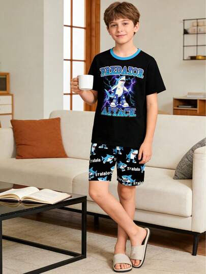 2pcs Loose Black Short Sleeve T-Shirt And Shorts Pajama Set. Short Sleeve Round Neck Shark Print Top Paired With Shark Print Shorts, Elastic Waist Design, Loose And Comfortable Fabric, Suitable For Home, Sleep, Leisure, Travel And Pajama Party. Must-Have Item For 2026 New Year.