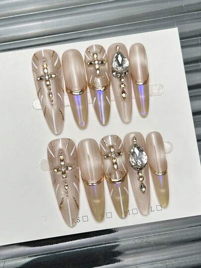 10片手工椭圆形亚克力美甲贴片，加长款，柔和裸粉色，闪亮猫眼，极光粉手绘不规则线条，镶嵌大颗钻石和神圣十字架，前卫优雅简约的秋季美甲，秋季美甲贴片，适合派对、日常、约会、海滩、热带度假等场合，DIY假指甲艺术，适合女性和女孩作为礼物，美甲用品