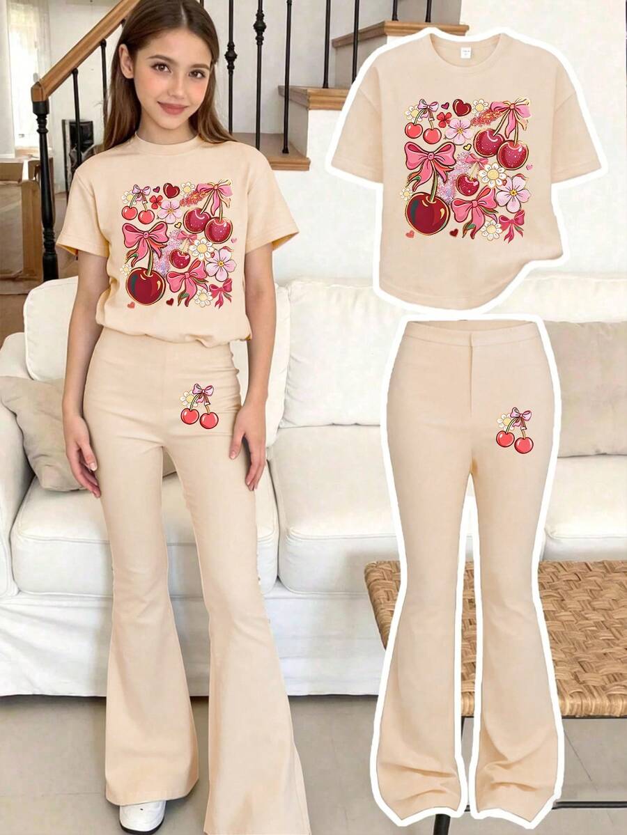 Este conjunto casual está diseñado para niñas, con un estampado impreso. El conjunto incluye una camiseta de manga corta con cuello redondo y pantalones acampanados a media cintura. - Albaricoque - Ver 1