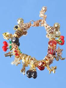 1 vòng tay mặt dây chuyền hình quả bóng bi-a in họa tiết da báo, 1 vòng tay hình thánh giá anh đào chủ đề lễ hội âm nhạc, 1 vòng tay hình ngôi sao in họa tiết da báo. - Vàng - Xem 16