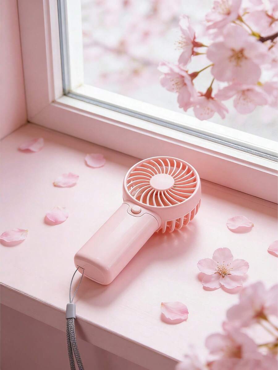 Quạt cầm tay mini 1 chiếc kèm dây đeo cổ tay, 1 chế độ gió, sử dụng pin AAA (không bao gồm).