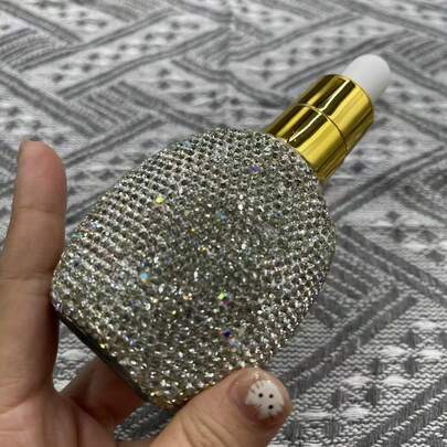 زجاجة عطر فاخرة مرصعة بالراين ستون سعة 30 مل، زجاجة عطر ذات قاع سميك، زجاجة إعادة تعبئة للمرطبات، زجاجة قطارة مطاطية، زجاجة فارغة محمولة