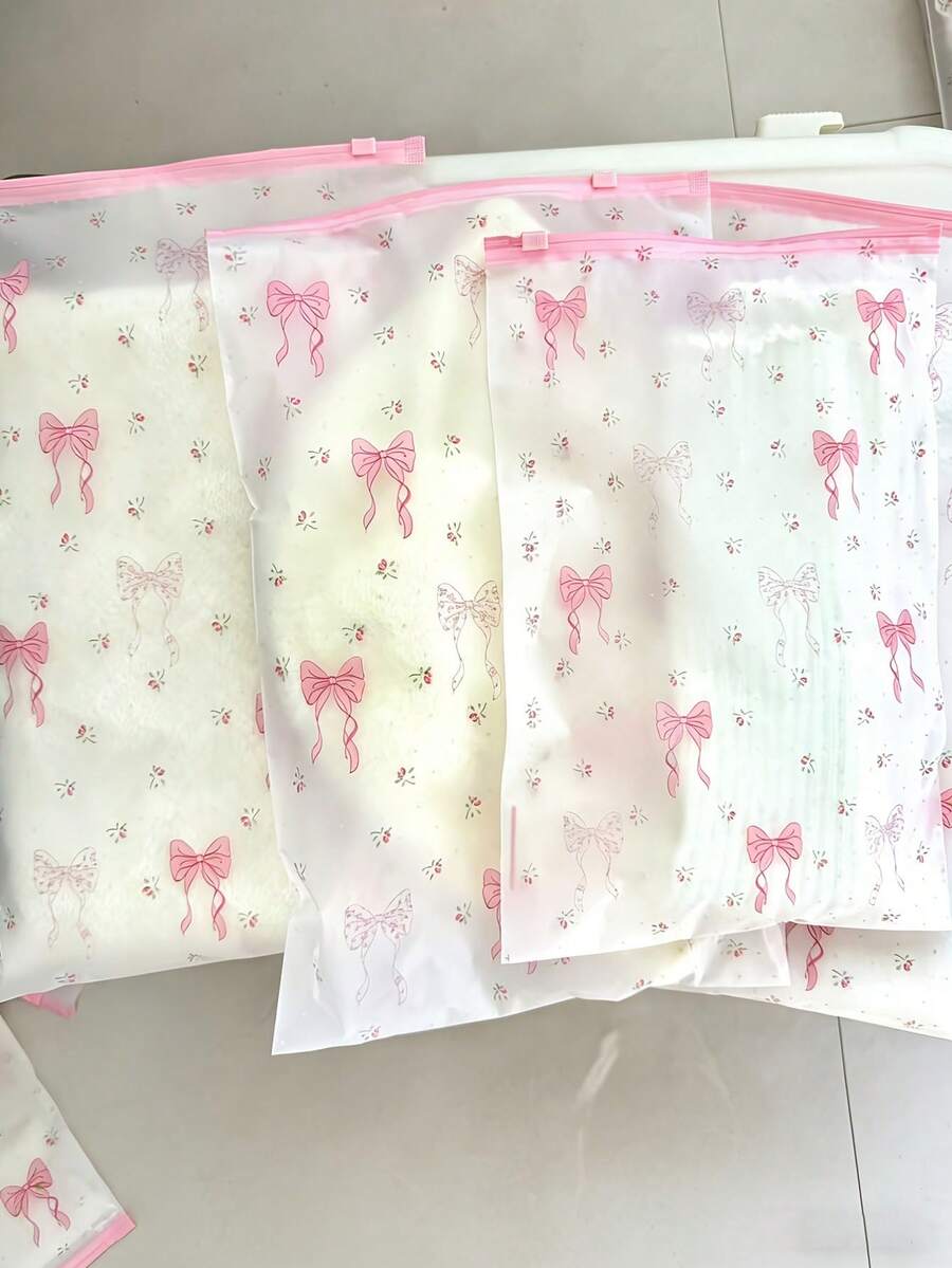10 túi đựng đồ trong suốt có khóa kéo họa tiết hoa và nơ - Lý tưởng để đựng quần áo, đồ dùng vệ sinh cá nhân, mỹ phẩm và sắp xếp đồ đạc, hoàn hảo cho du lịch, đóng gói hành lý, bền và chống thấm nước. - Nhiều màu - Xem 1