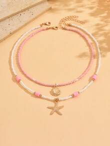 2件套女孩夏季可爱沙滩风贝壳海星合金吊坠项链套装，双层串珠，适合海滩度假，串珠位置随机 - 粉色 - 查看 1