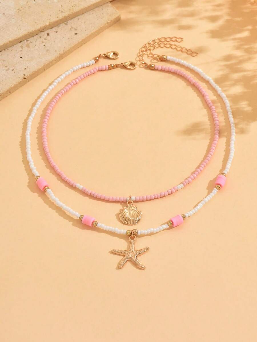 2件套女孩夏季可爱沙滩风贝壳海星合金吊坠项链套装，双层串珠，适合海滩度假，串珠位置随机 - 粉色 - 查看 1