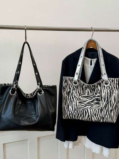 1个极简主义双面托特包，ins风，高端小众设计，大容量单肩包，适合通勤、办公、约会、购物、短途旅行、周末、聚会等场合，是都市白领和极简主义爱好者的理想之选。