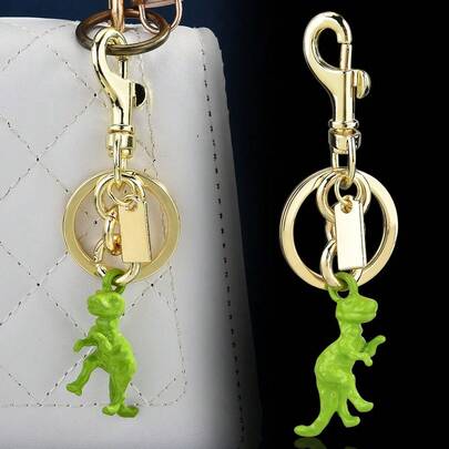 Móc khóa hình khủng long đứng màu xanh lá cây thuộc bộ sưu tập American Fun Animal Series, dùng để trang trí quần áo hoặc túi xách.