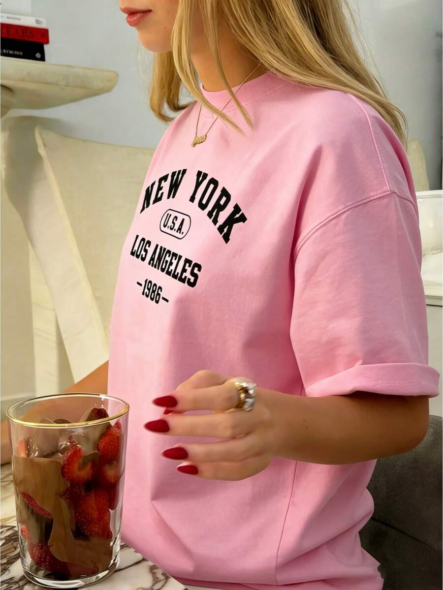 New York Los Angeles Independence Day Graphic Tee Independence Day Shirt Y2k Woman Teen Girls Tee,Vintage Print Top, Funny Cute Graphic Letter Tee Crew Neck Cool Summer Shirt Short Sleeve Top,Animal Fruite Pet Pattern, Women Graphic-Shirt, Fashion 2025,Gifts, Women's Clothing, Cartoon And Letter Printing, Comfortable Cotton Material, Skin Friendly, Soft And Cool, Spring Summer Women's-Shirt ClothingSports Short Sleeves - 粉色 - 查看 1