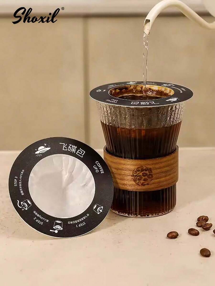 shoxil 20 قطعة ورق فلتر قهوة على شكل صحن طائر، ورق فلتر معلق على الأذن، ورق فلتر قهوة للغسل اليدوي، ورق فلتر مسحوق القهوة، أكياس قهوة معلقة على الأذن قابلة للتخلص، مناسبة لأكواب القهوة بأحجام وفتحات مختلفة، يمكن توزيع القهوة بسهولة للحمل المريح في العمل والدراسة والحياة اليومية، العودة إلى المدرسة، لوازم مدرسية - ورق الترشيح - مشاهدة 1