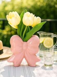 1 chiếc bình hoa lớn bằng nhựa hình nơ, dùng trang trí sân vườn và kệ phòng ngủ, màu hồng/trắng. - Bình hoa hình nơ - Xem 4